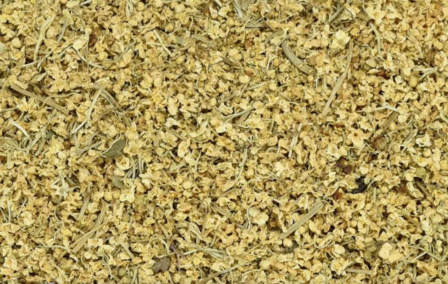 Close-up of dried elderflowers, showing tiny yellow flowers used for teas and herbal remedies.