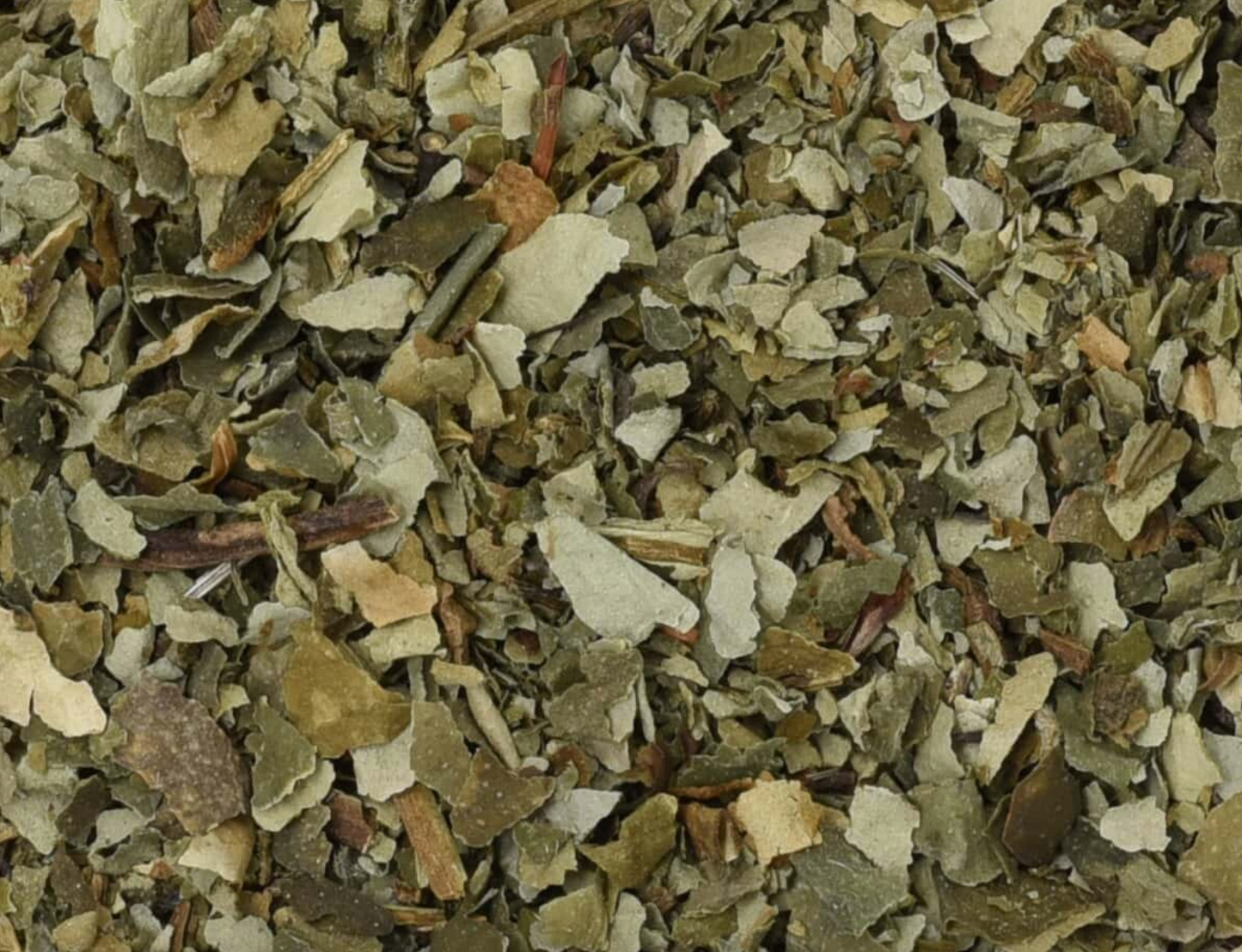 Close-up of dried lungwort herb, showing chopped green leaves used for teas and herbal remedies.