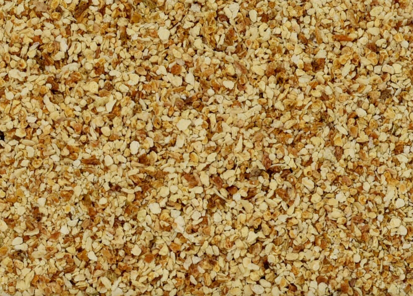 Close-up of dried orange peel, showing finely cut orange peel used for teas and herbal remedies.