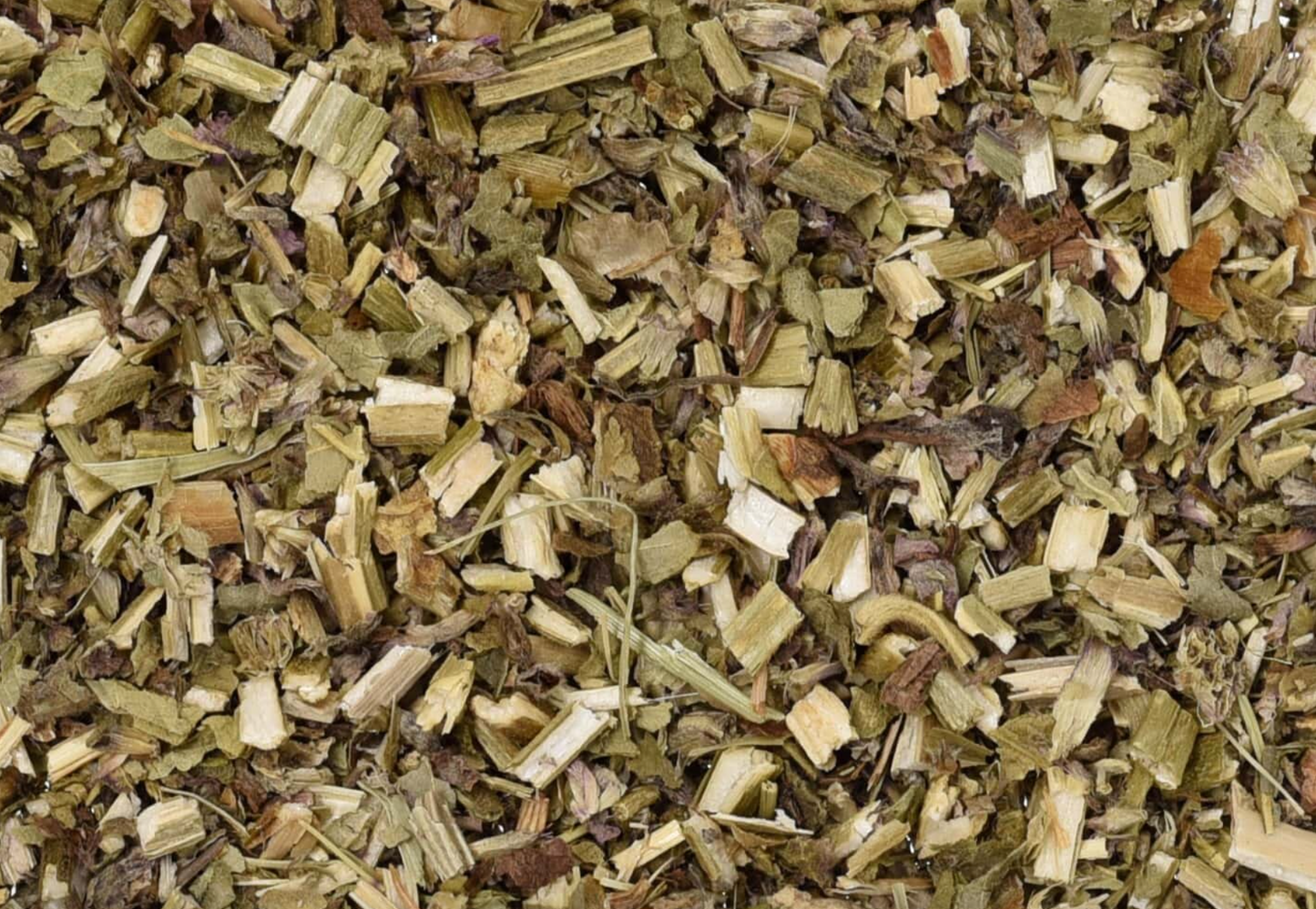 Close-up of dried wood betony herb, showing chopped stems, leaves, and pieces used for teas and herbal remedies.