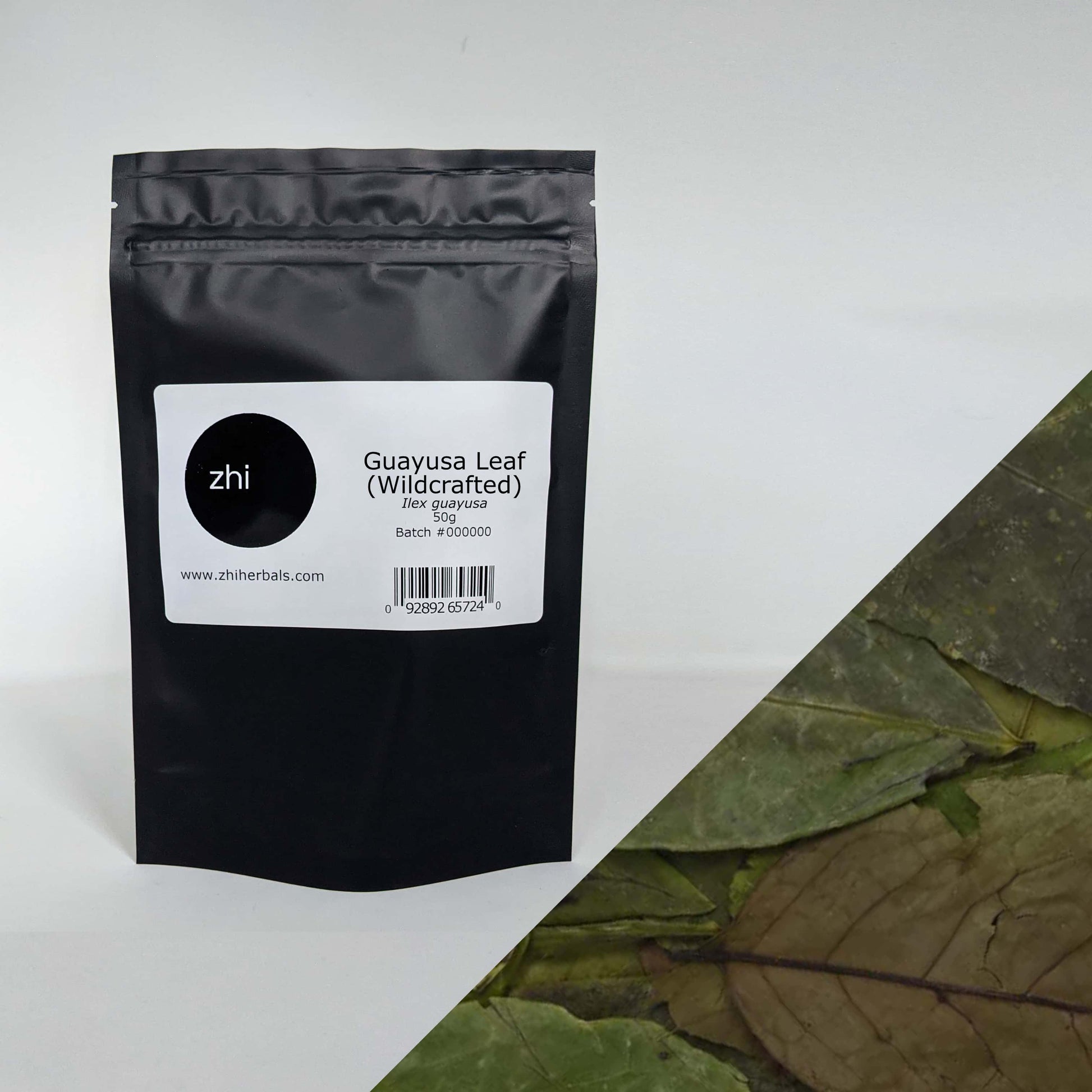 Zhi Herbals Wildcrafted Guayusa Leaf, 50g black package with label, next to a close-up of the dark green leaf.