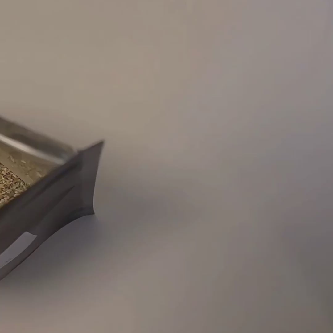 Aerial view of a bag of bulk dried catnip herb.