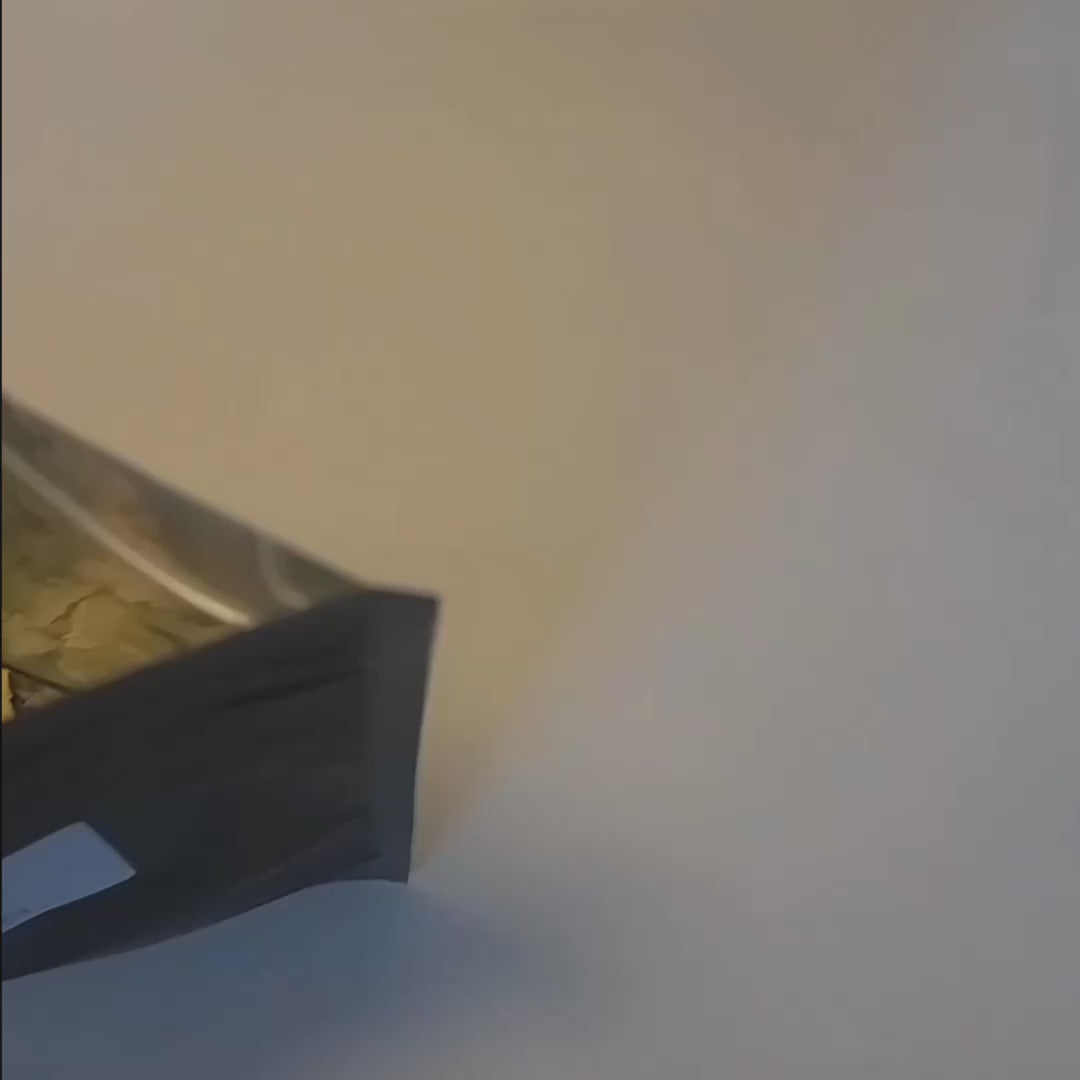 Aerial view of a bag of dried senna leaf.
